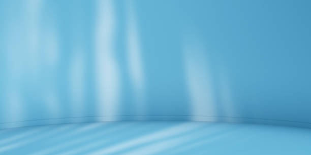 istock Blue minimalist curved studio for product presentation. Empty room with shadows of blinds. 3d room background with copy space. 3d render illustration 2164477424