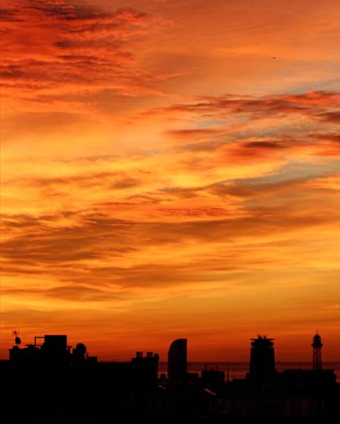 istock Barcelona skyline on a cloudy winter sunrise 2164479640