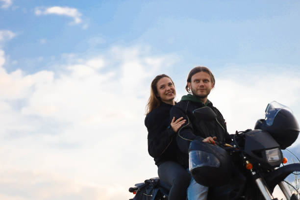 istock couple on a motorcycle in a field, date on a motorcycle 2164484604