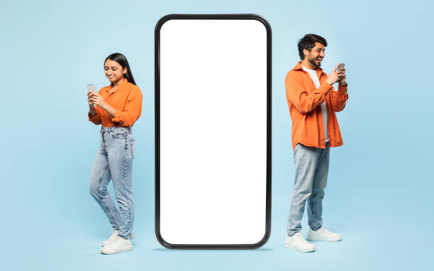 istock Couple interacting with a blank smartphone screen 2164484679