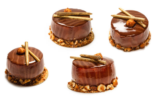 istock Chocolate and caramel cake isolated on a white background. 2164488490