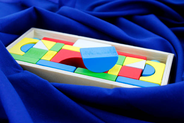 Wooden box with colorful geometric figures