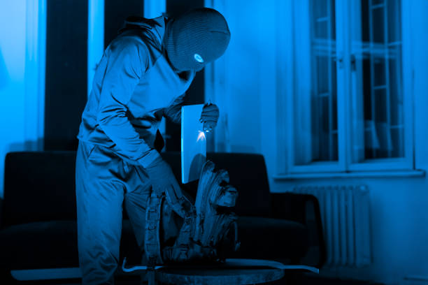 istock Masked man criminal preparing tools for burglary 2164493460