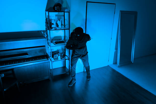 istock Silent thief in a room ready to steal 2164493555