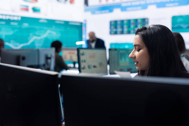 istock Business administrator examining data for the investors group 2164494485
