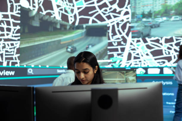 istock Indian woman locating delivery trucks via satellite map with gps coordinates 2164504844