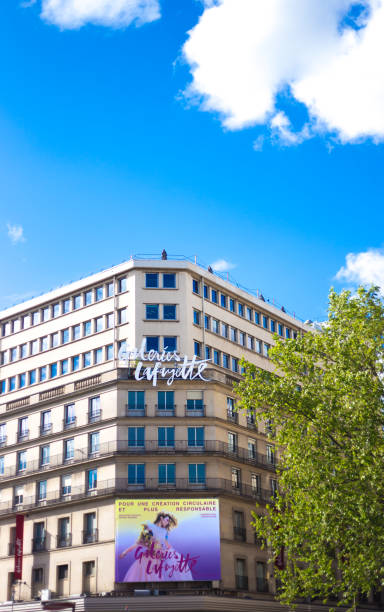 Paris, France: The flagship Galeries LaFayette department store on Boulevard Haussmann in the 9th arrondissement in springtime; this building was opened for shopping in 1912.