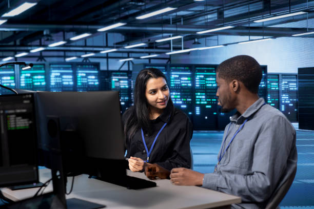 istock Teamworking colleagues monitoring servers for overheating problems 2164508688