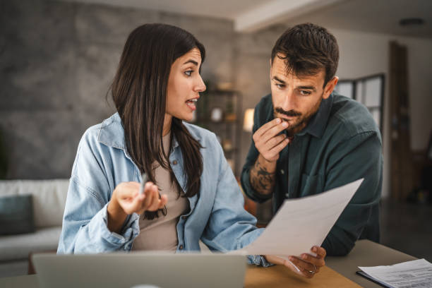 istock couple boyfriend and girlfriend read together letter from envelope 2164510059
