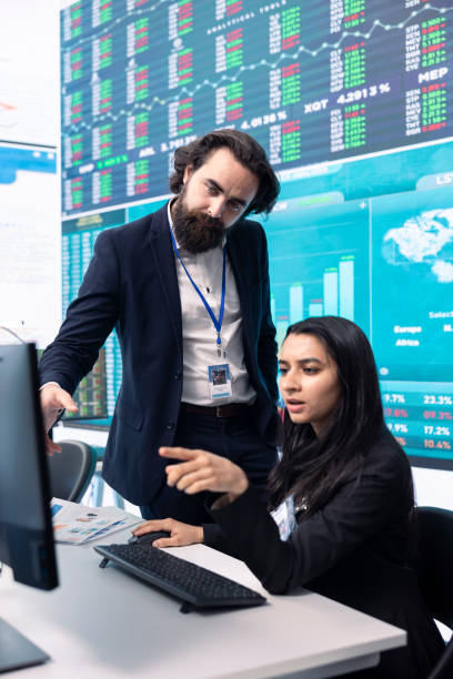 istock Team of analysts calculating profit amount and making decisions 2164511237