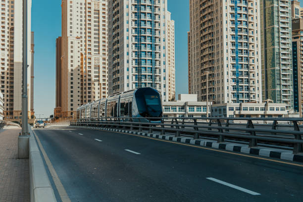 istock Modern tram moving through the urban cityscape 2164511537
