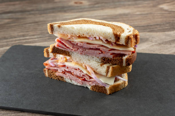 istock stacked pastrami sandwich 2164511693