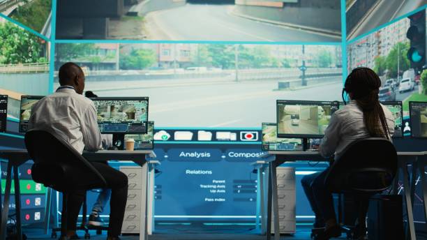 istock Diverse employees working on examining real time surveillance footage 2164514317