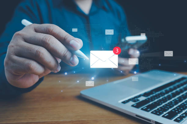 istock Email marketing concept, Human touch on email and surfing the internet with email icon, email icon, e-mail communication, e-mail marketing concept, send e-mail or news letter, online working internet. 2164515001
