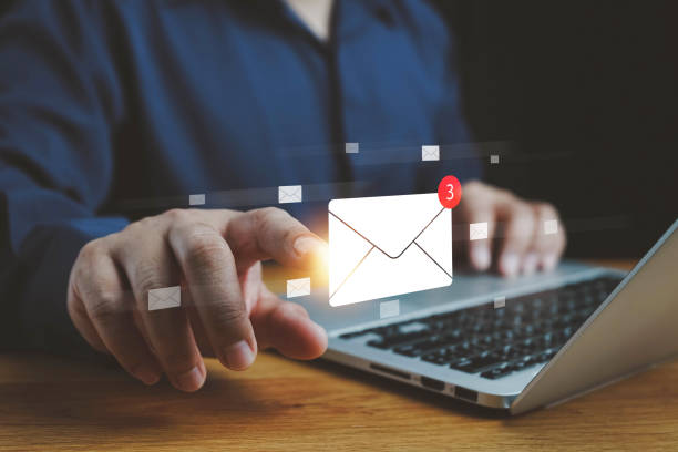 istock Email marketing concept, Human touch on email and surfing the internet with email icon, email icon, e-mail communication, e-mail marketing concept, send e-mail or news letter, online working internet. 2164515011
