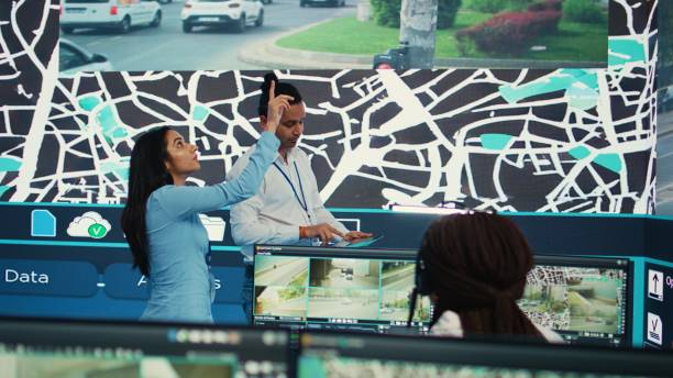 istock Indian supervisors examining traffic routes on satellite map 2164517004