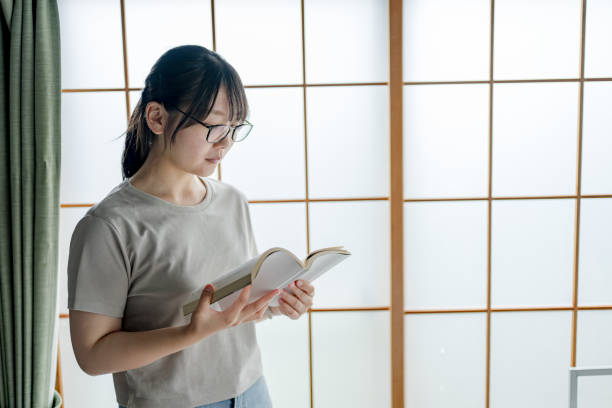 istock Text book and woman 2164519720