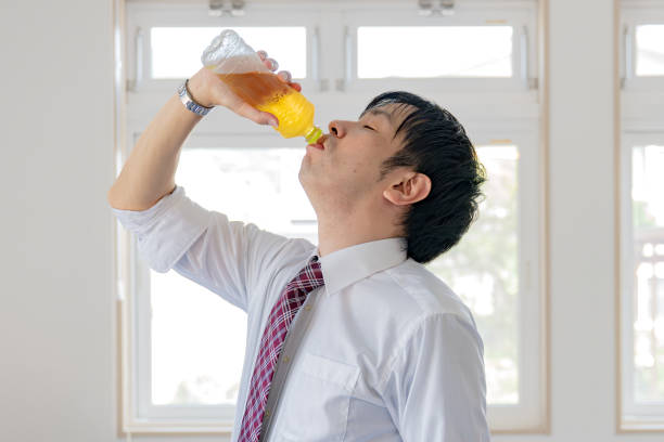 istock BUSINESS MAN DRINK 2164522115