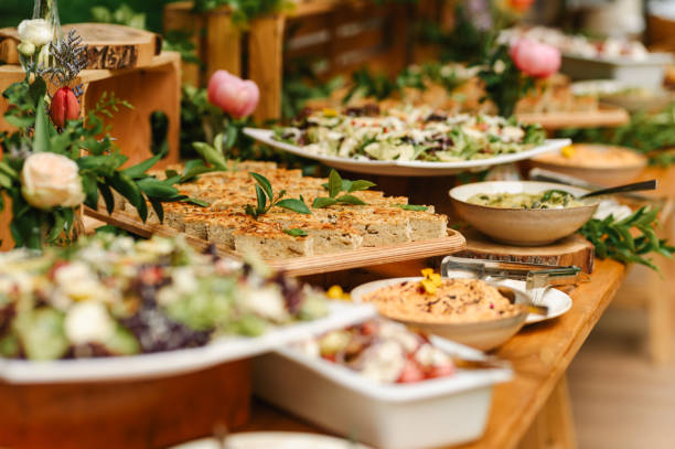 istock Buffet food for party decorated with fresh plants. 2164523347