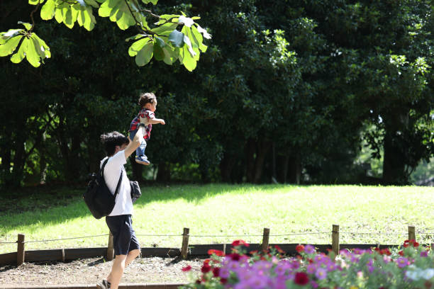 istock Family in morning park 2164532881