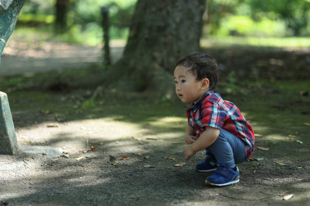 istock Young child playing at park 2164533899