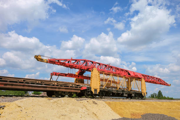 Track layer for transporting and laying rail and sleeper grids on railway tracks. Railway transport during the construction and repair of railways.