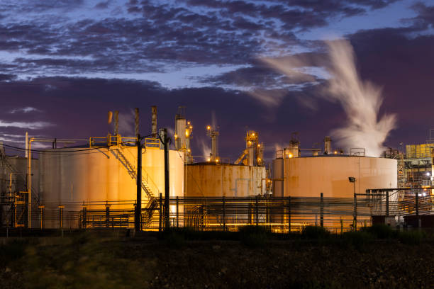 Carbon dioxide, a global warming gas, escapes from an industrial oil refining and storage operation in the South Bay of Los Angeles, California, USA.