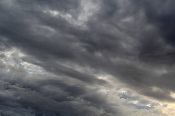 istock Dark clouds in the sky at dusk cloudscape 2164535871
