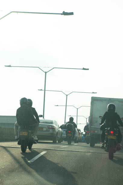 istock Motorcyclists in the city 2164540344