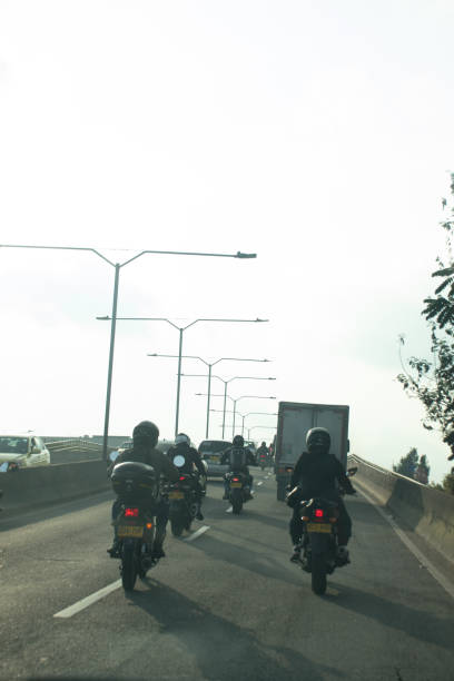 istock Motorcyclists in the city 2164540345