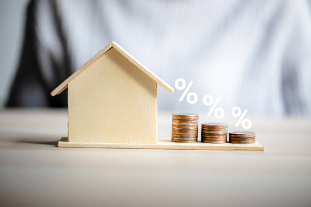 istock Coins stack arrangement from minimum to maximum on a model home wooden with text percent show to interest rate increase house have an effect loan on customers, mortgage and financial concept. 2164548017