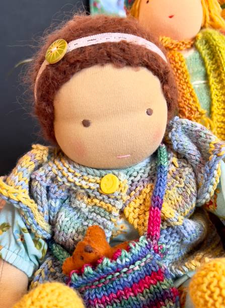 istock Cute Handmade Dolls with Hand-knitted Clothes and Accessories 2164560791