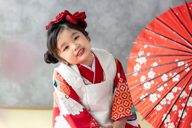 istock girl wearing kimono 2164562588