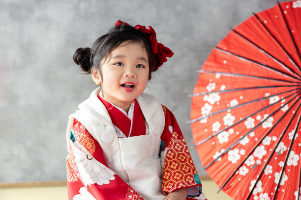 istock girl wearing kimono 2164562596