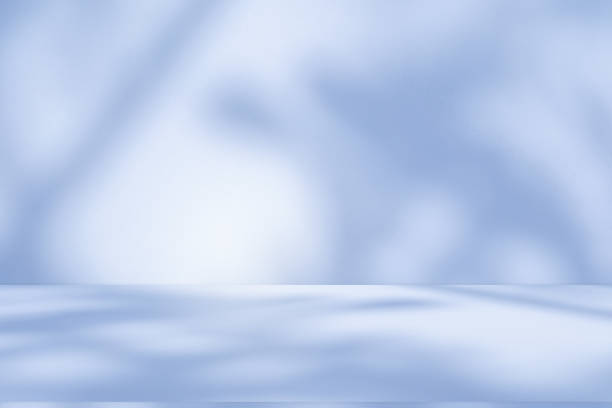 istock Studio style background wall decoration presentation uses white and blue tones. with shadows cast from a nearby window, concept creating a decorative 2164562766
