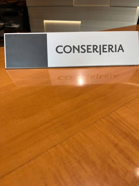 istock Concierge sign on check in desk 2164564390