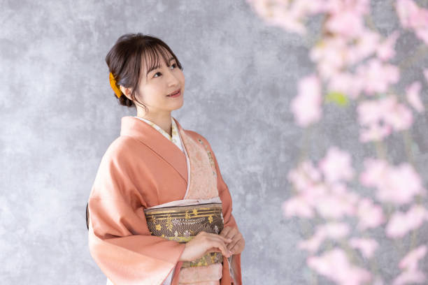 istock woman wearing kimono 2164564529