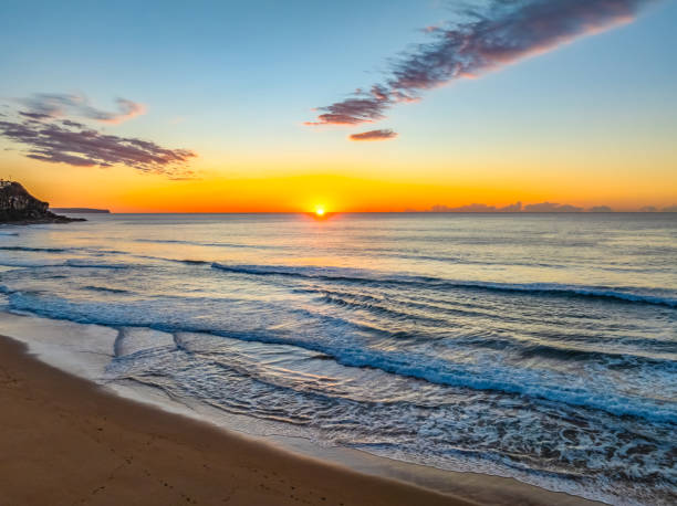istock Northern Beaches Sunrise at the seaside with rain clouds 2164567609