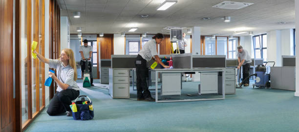 istock happy commercial cleaning team 2164568153