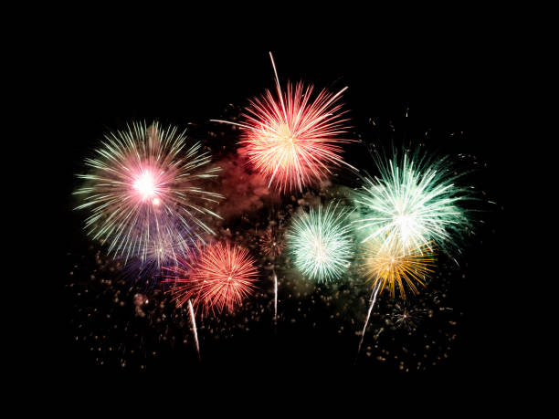 istock Festive new year colorful fireworks on black background 2164569249