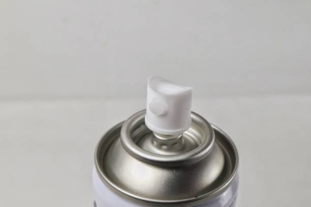 istock close up paint can spray nozzle white background 2164569429