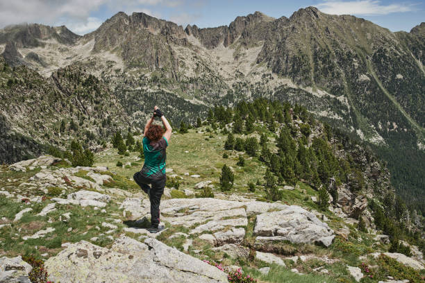 istock Senior hiking in the high mountains 2164570825