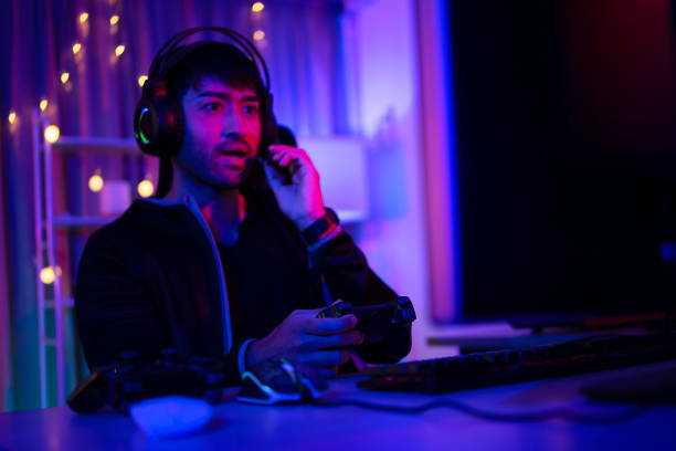 istock Handsome man is livestreaming video game as influencer. 2164575945