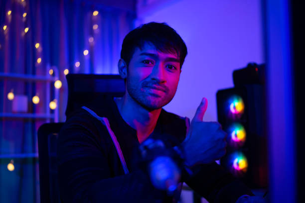 istock Handsome man is livestreaming video game as influencer. 2164575958