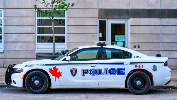 Toronto Police car in the Toronto Santa Claus Parade. Toronto, Canada - November 24, 2024.