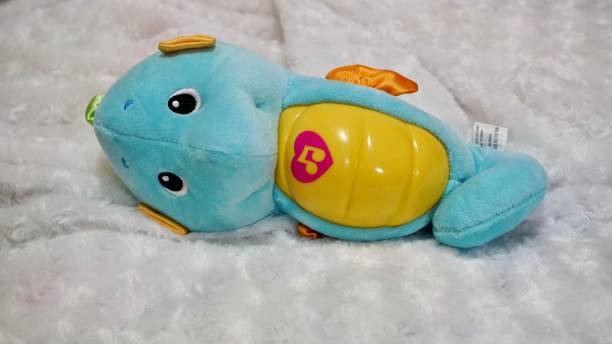 istock blue seahorse doll 2164580750