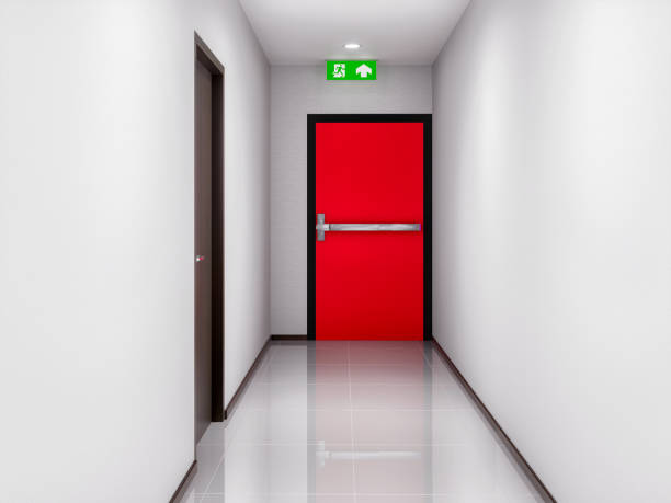 istock emergency fire exit sign or fire escape with the doorway or door exit in the building 2164583134