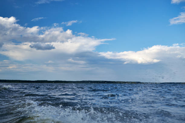 view from a motorboat on a wave on the river