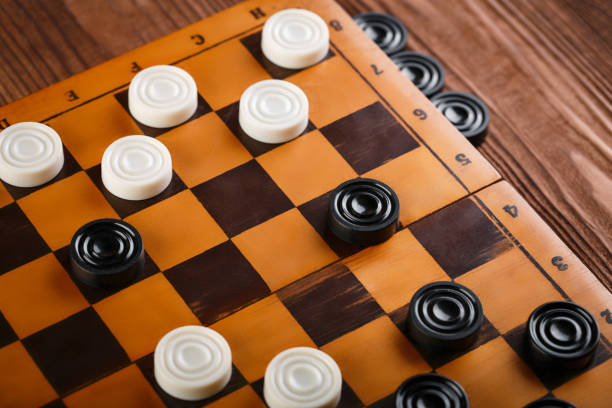istock checkerboard with checkers. Game concept. Board game. Hobby. checkers on the playing field for a game. 2164587682