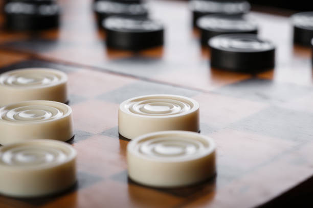 istock checkerboard with checkers. Game concept. Board game. Hobby. checkers on the playing field for a game. 2164587760